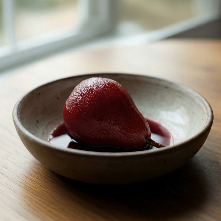 Poire pochée au vin rouge